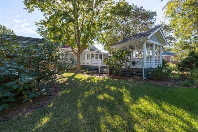 view of yard featuring a deck