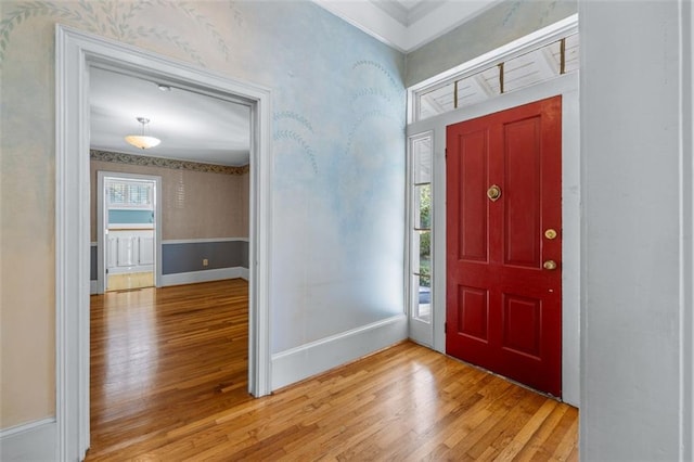 150 E Main St, Rutledge, GA 30663 - entrance foyer with light wood-style flooring, wallpapered walls, ornamental molding, and baseboards