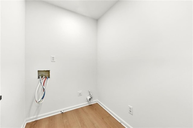 3684 Clearbrooke Way, Duluth, GA 30097 - washroom featuring hookup for a washing machine, light wood-style floors, baseboards, hookup for an electric dryer, and gas dryer hookup