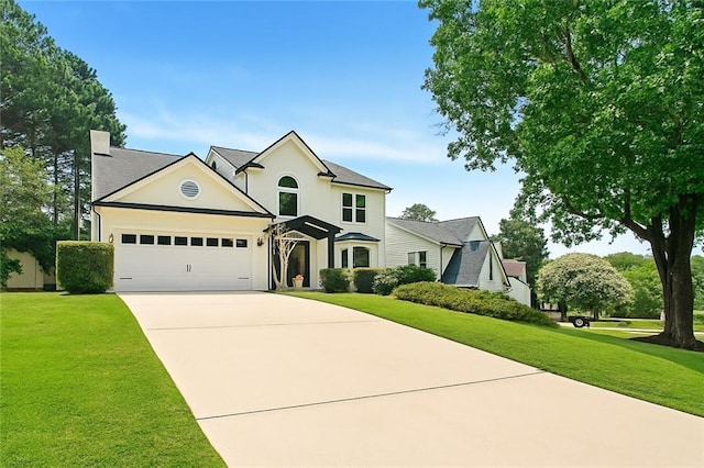 3684 Clearbrooke Way, Duluth, GA 30097 - traditional-style house with concrete driveway, a front yard, an attached garage, and stucco siding