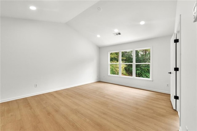 3684 Clearbrooke Way, Duluth, GA 30097 - spare room with light wood-style flooring, lofted ceiling, recessed lighting, and baseboards