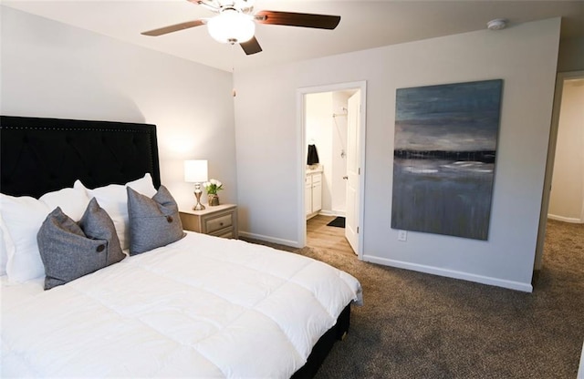 bedroom with carpet flooring, ceiling fan, ensuite bath, and baseboards