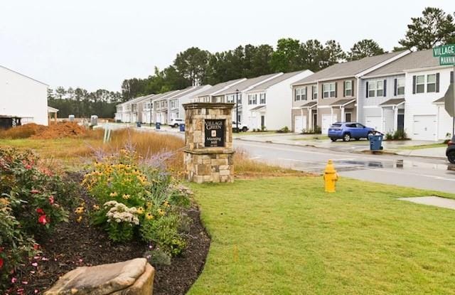 view of yard featuring a residential view