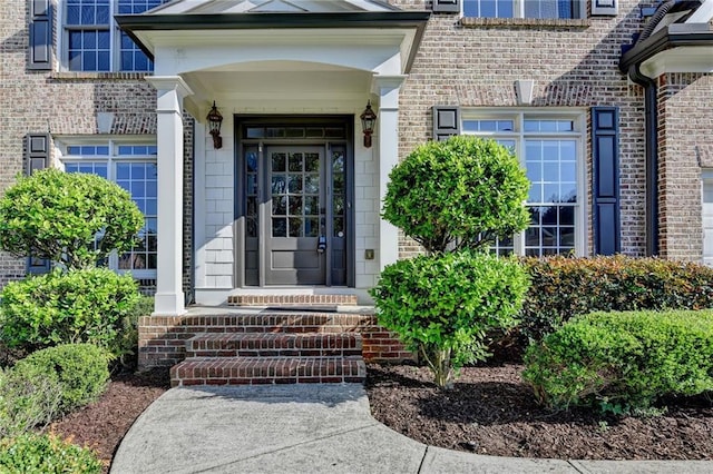 1723 Woodbow Path, Dacula, GA 30019 - view of exterior entry featuring brick siding