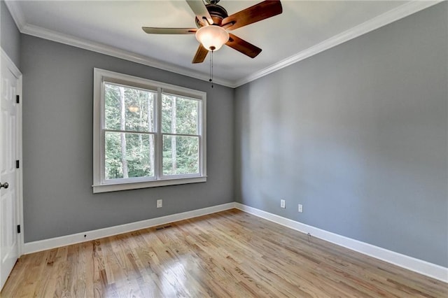 1723 Woodbow Path, Dacula, GA 30019 - empty room with light wood-style floors, ornamental molding, and a ceiling fan