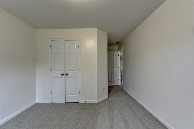 1723 Woodbow Path, Dacula, GA 30019 - unfurnished bedroom with carpet flooring and a closet