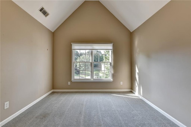 1723 Woodbow Path, Dacula, GA 30019 - carpeted spare room featuring lofted ceiling and baseboards