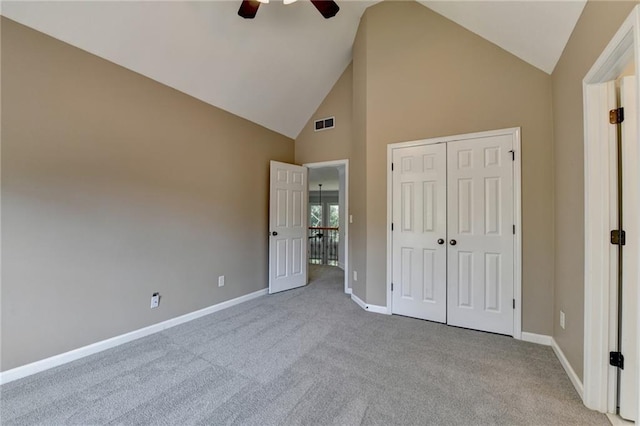 1723 Woodbow Path, Dacula, GA 30019 - unfurnished bedroom featuring high vaulted ceiling, carpet, a closet, and a ceiling fan