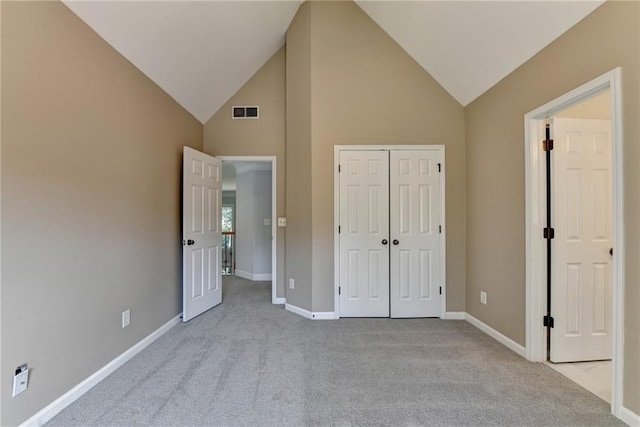 1723 Woodbow Path, Dacula, GA 30019 - unfurnished bedroom featuring carpet, high vaulted ceiling, and a closet