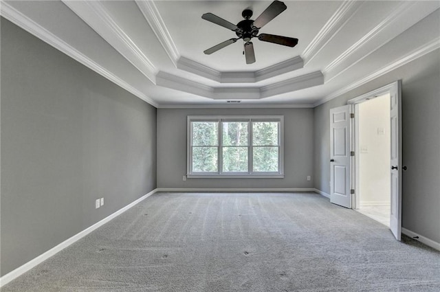 1723 Woodbow Path, Dacula, GA 30019 - unfurnished room featuring carpet flooring, crown molding, a ceiling fan, and a raised ceiling