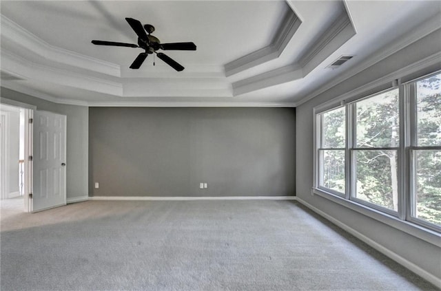 1723 Woodbow Path, Dacula, GA 30019 - spare room with crown molding, a tray ceiling, carpet, and ceiling fan
