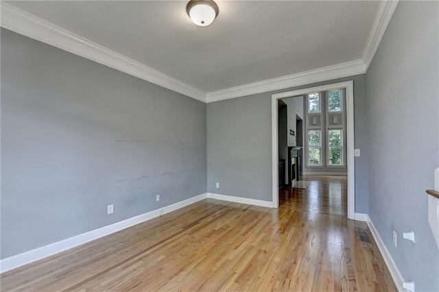 1723 Woodbow Path, Dacula, GA 30019 - empty room featuring crown molding and light wood finished floors