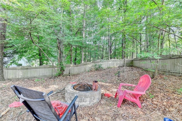 1723 Woodbow Path, Dacula, GA 30019 - fenced backyard featuring an outdoor fire pit