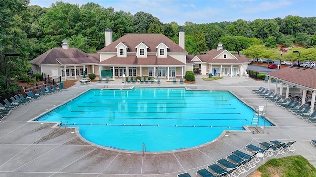 1723 Woodbow Path, Dacula, GA 30019 - community pool with a patio area and french doors