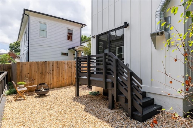 exterior space with an outdoor fire pit