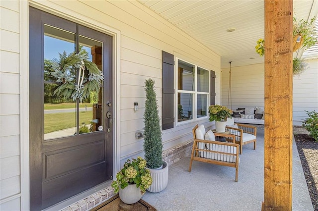 view of patio featuring a porch