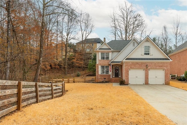 view of front of home featuring a garage, brick siding, fence, driveway, and crawl space