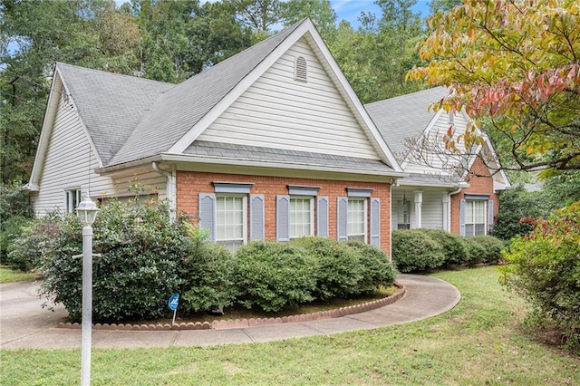 view of property exterior with a lawn