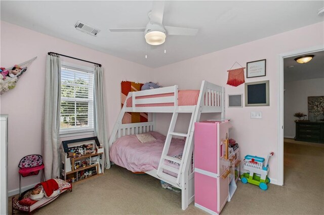 carpeted bedroom featuring a ceiling fan