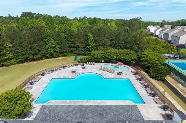 community pool with a patio