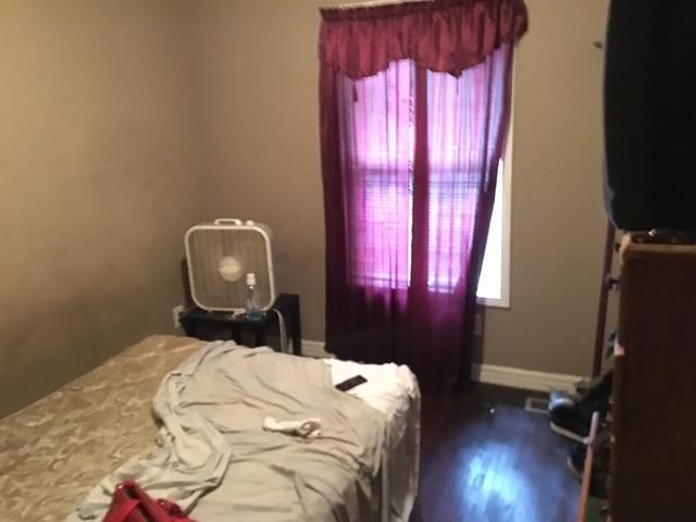 1566 Avon Ave SW, Atlanta, GA 30311 - bedroom with wood finished floors
