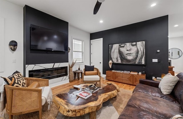 210 Locust St NE, Atlanta, GA 30317 - living area with light wood-type flooring, a ceiling fan, and recessed lighting