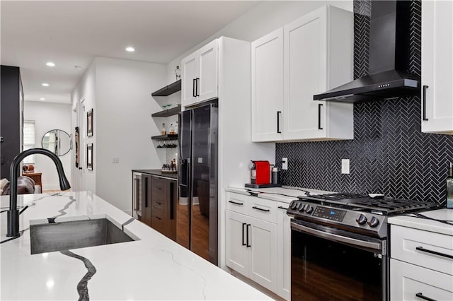 210 Locust St NE, Atlanta, GA 30317 - kitchen with stainless steel gas range, open shelves, a sink, wall chimney exhaust hood, and black fridge with ice dispenser