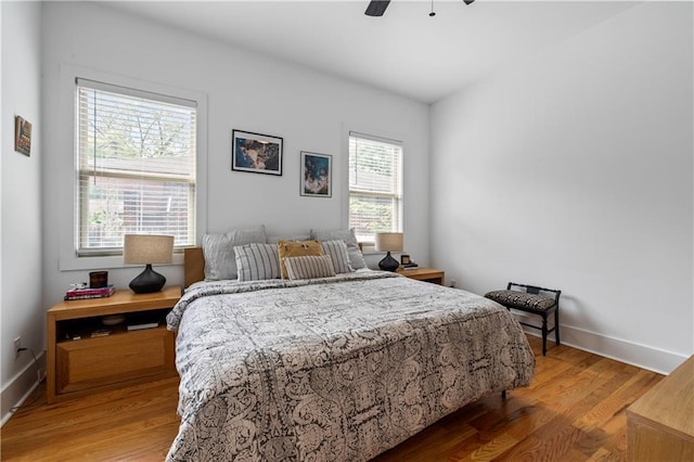 210 Locust St NE, Atlanta, GA 30317 - bedroom with a ceiling fan, baseboards, and wood finished floors