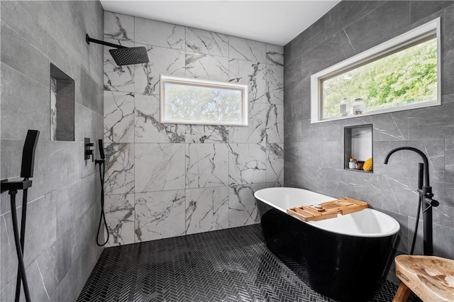 210 Locust St NE, Atlanta, GA 30317 - bathroom with a freestanding bath, a tile shower, and tile walls