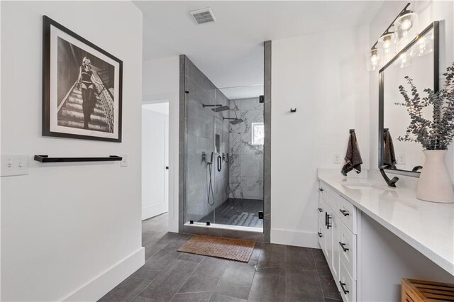 210 Locust St NE, Atlanta, GA 30317 - bathroom featuring vanity, baseboards, a stall shower, and visible vents