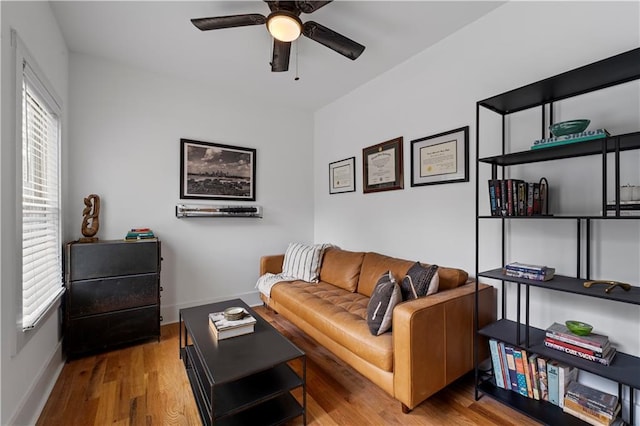 210 Locust St NE, Atlanta, GA 30317 - living room with baseboards, ceiling fan, a healthy amount of sunlight, and wood finished floors