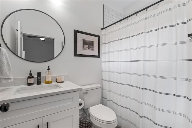 210 Locust St NE, Atlanta, GA 30317 - bathroom with toilet, a shower with shower curtain, and vanity