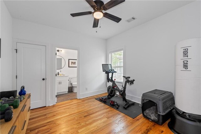 210 Locust St NE, Atlanta, GA 30317 - workout area featuring visible vents, light wood-style flooring, ceiling fan, and baseboards