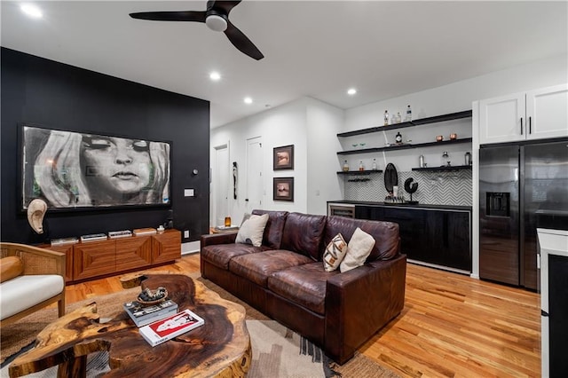 210 Locust St NE, Atlanta, GA 30317 - living area featuring recessed lighting, ceiling fan, light wood finished floors, and wet bar