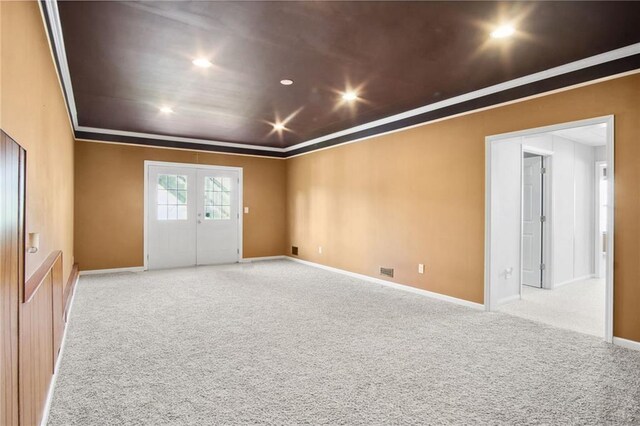 basement with wooden walls, a paneled ceiling, carpet, recessed lighting, and baseboards