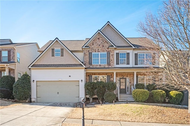 craftsman house with a garage