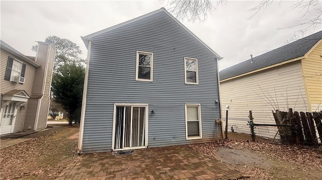 rear view of house with a patio