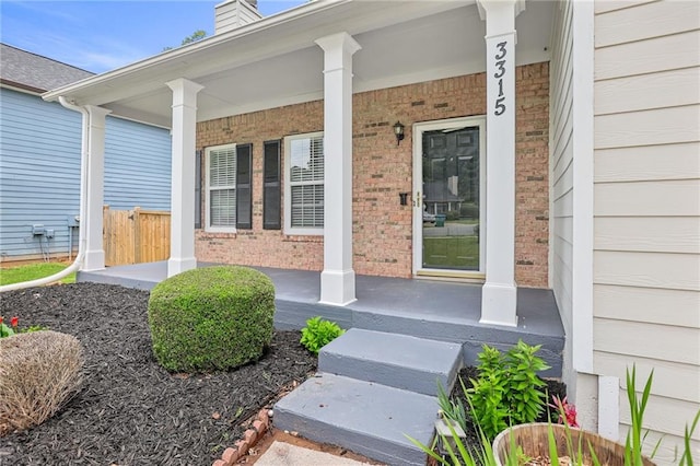 3315 Brookfield Dr, Austell, GA 30106 - entrance to property with covered porch, brick siding, and a chimney