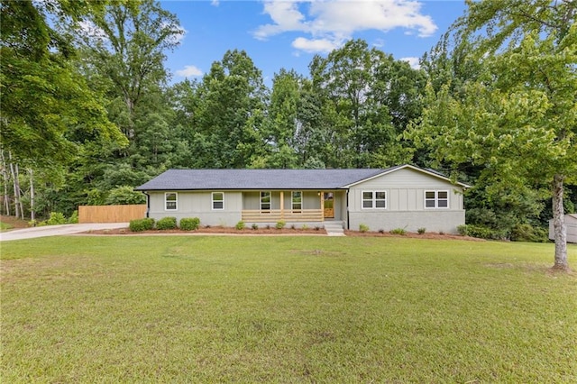 6142 Hutchins Dr, Buford, GA 30518 - single story home featuring driveway