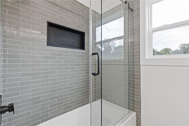 6142 Hutchins Dr, Buford, GA 30518 - bathroom with bath / shower combo with glass door