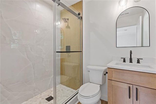 6142 Hutchins Dr, Buford, GA 30518 - full bath featuring toilet, vanity, and a stall shower