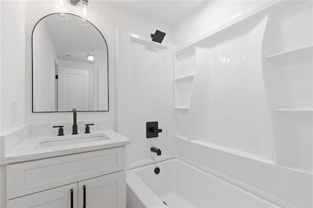 6142 Hutchins Dr, Buford, GA 30518 - bathroom featuring vanity and shower / tub combination