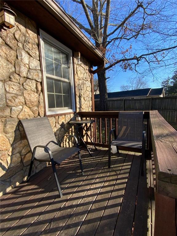 wooden deck featuring fence