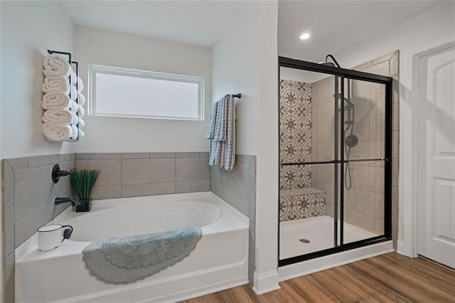 7935 Welch Ml, Ball Ground, GA 30107 - bathroom featuring a bath, wood finished floors, and a shower stall