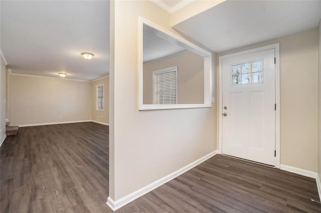 entrance foyer featuring dark hardwood / wood-style floors and ornamental molding