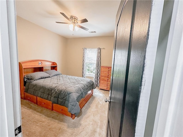 bedroom featuring carpet and ceiling fan