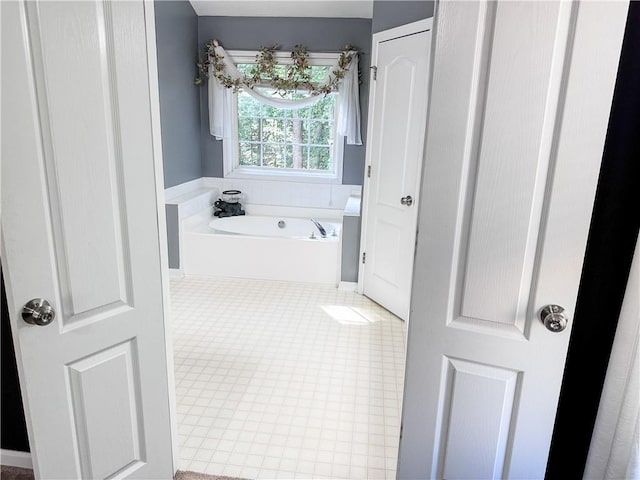 full bath with a bath