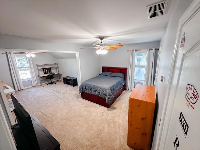 carpeted bedroom featuring a ceiling fan