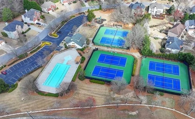 aerial perspective of suburban area with a pool area