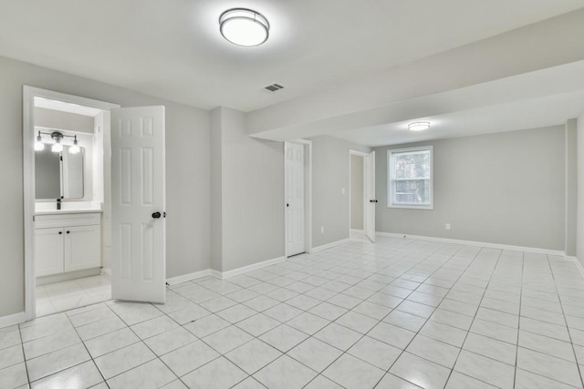 view of tiled spare room